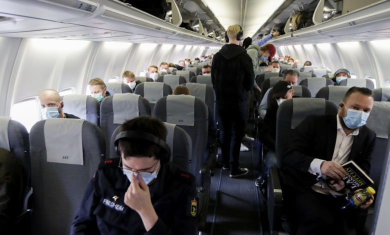 Advarer mot å fly etter coronasmitte